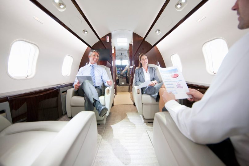 Passengers sitting on a private jet
