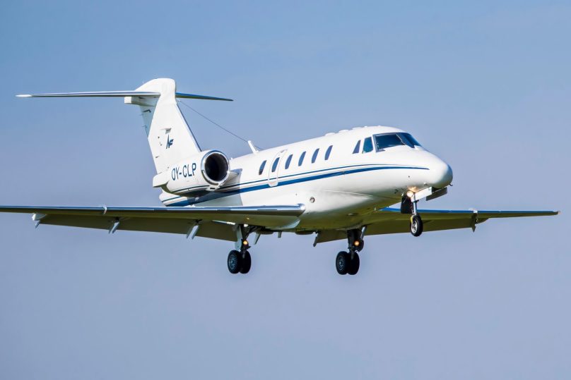 Citation VII in flight on approach to the airport